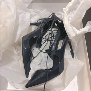 Navy Jimmy choo Vida 100. Heel height is 4”.